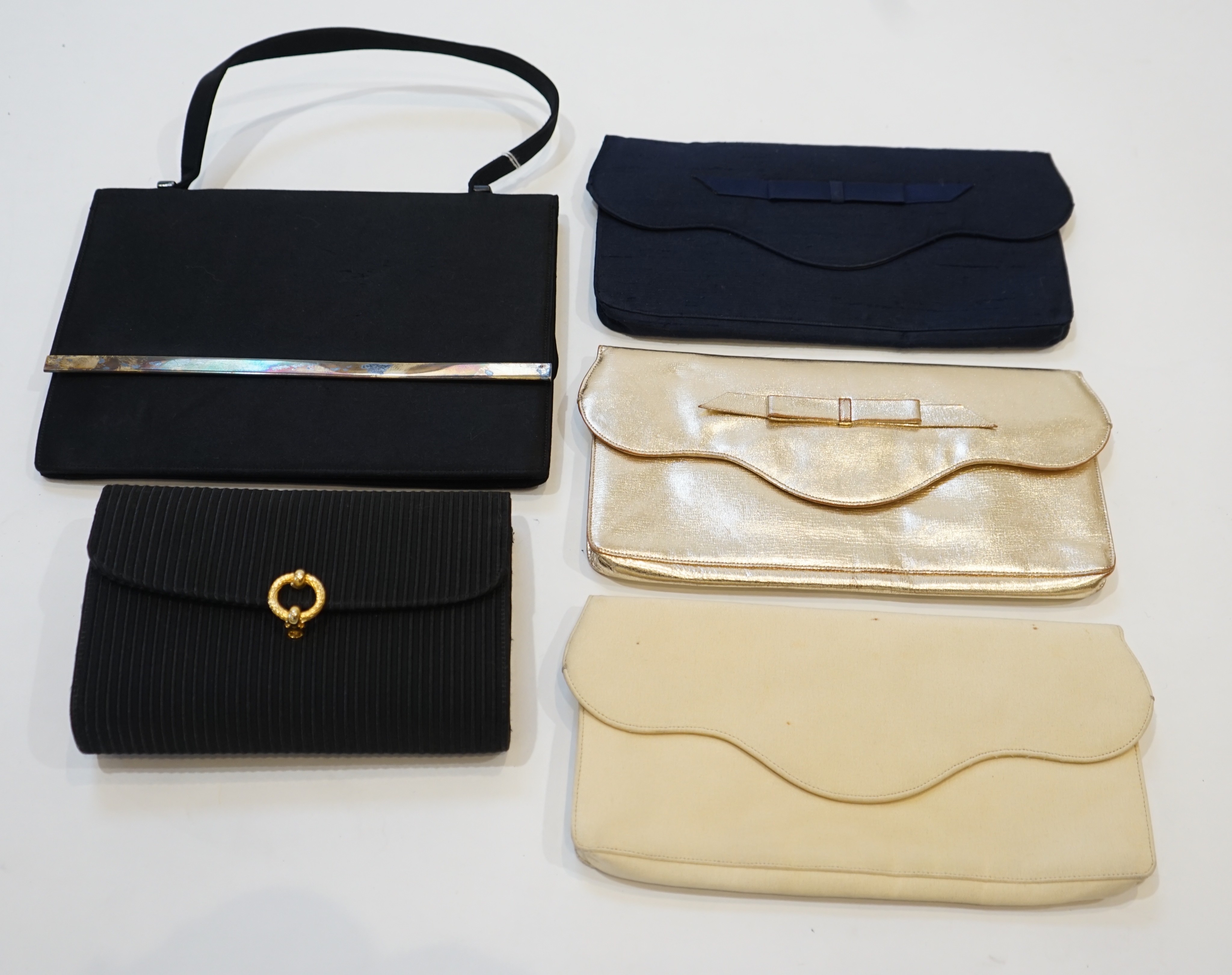 A group of five assorted Asprey evening bags